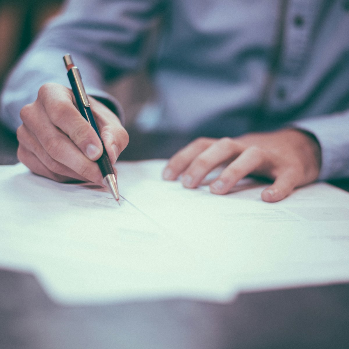 Person signing shipping documents